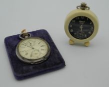 A silver plated pocket watch, together with another. The former 5 cm diameter.