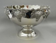 A silver plated punch bowl decorated with grapes. 38 cm diameter.