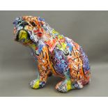 A model bulldog with graffiti style decoration. 39 cm high.