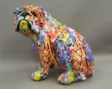 A model bulldog with graffiti style decoration. 39 cm high.