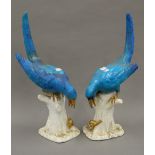 A pair of Victorian Moore & Co blue glazed porcelain birds. 47 cm high.