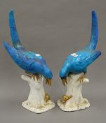 A pair of Victorian Moore & Co blue glazed porcelain birds. 47 cm high.