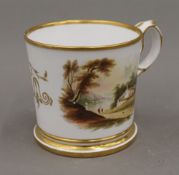 A fine English porcelain hand painted mug, circa 1830. 11 cm high.