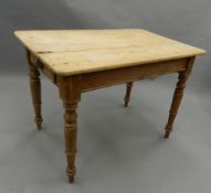 A Victorian pine table. 103 cm long.
