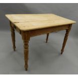 A Victorian pine table. 103 cm long.