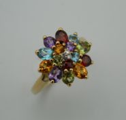 A 9 ct gold multi-gem set ring. Ring size K.