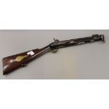 A percussion cap blunderbuss with spring loaded bayonet,