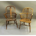 Two 19th century elm seated Windsor chairs. The largest 59 cm wide.