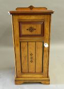 A Victorian Arts and Crafts painted oak bedside cabinet. 39 cm wide.