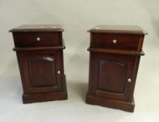 A pair of modern bedside cupboards. Each 39 cm wide x 65 cm high.