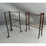 An Edwardian mahogany towel rail and another. The former 67 cm long.