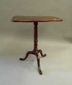 A 19th century mahogany tripod table. 58.5 cm wide.