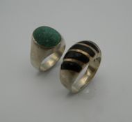 Two gentleman's silver rings (35 grammes)