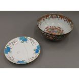 An 18th century Chinese bowl decorated with court scenes,