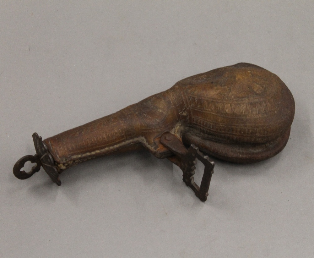 An antique camel scrotum powder flask. 20.5 cm high. - Image 2 of 4