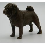 A small bronze model of a pug dog. 7 cm long.
