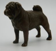 A small bronze model of a pug dog. 7 cm long.