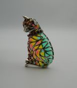 A silver plique a jour cat brooch. 4 cm high.