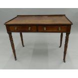A 19th century mahogany two drawer side table. 91 cm wide.
