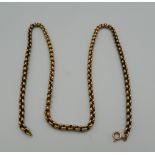 A 9 ct gold chain. 58 cm long (19.