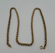 A 9 ct gold chain. 58 cm long (19.