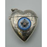 A silver heart shaped vesta with Masonic emblem. 4 cm high.