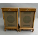 A pair of walnut cased speakers. 84 cm high.