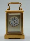 A miniature carriage clock. 7.5 cm high.