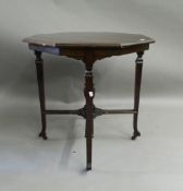 An Edwardian mahogany octagonal centre table. 70 cm wide.