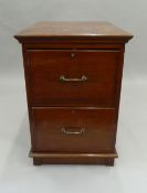 A Victorian walnut filing cabinet. 79 cm high.