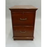 A Victorian walnut filing cabinet. 79 cm high.