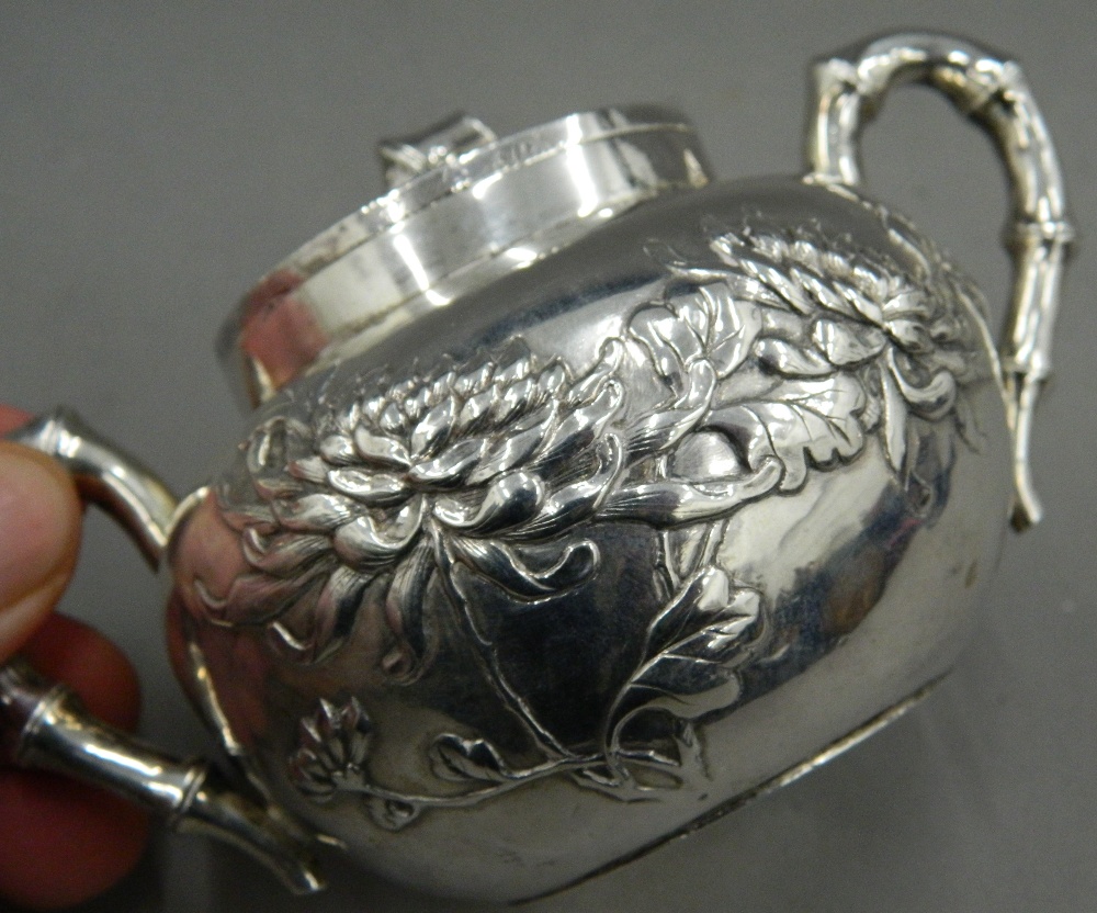 A Chinese silver three piece tea set, - Image 10 of 13