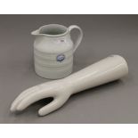 A Portsmouth Infirmary jug and a white porcelain hand. The former 17 cm high.
