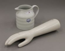 A Portsmouth Infirmary jug and a white porcelain hand. The former 17 cm high.