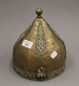 An Antique Ottoman/Turkish brass helmet. 22 cm high.