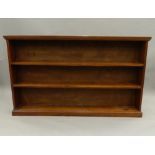 A late 19th/early 20th century mahogany and pine open bookcase.