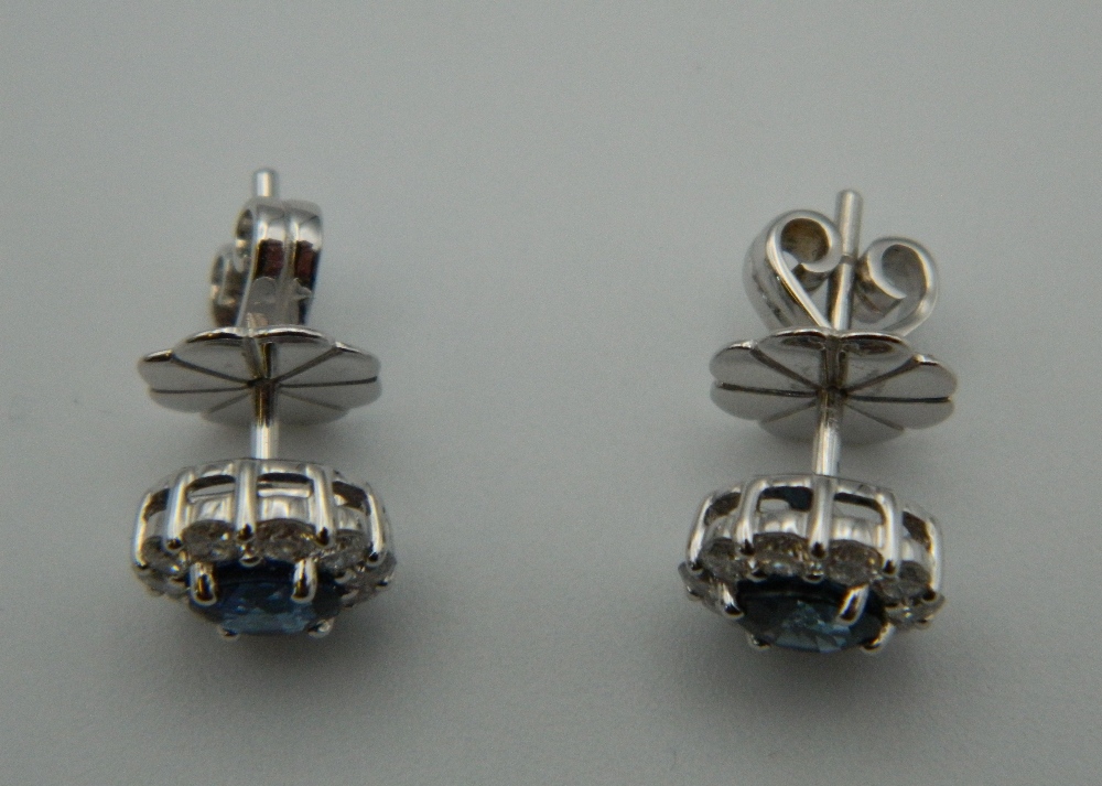 A pair of 18 ct white gold quality diamond and sapphire halo earrings. - Image 2 of 3