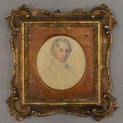 A 19th century pencil and watercolour portrait, in original frame.