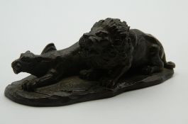 A Japanese bronze model of two lions. 10 cm long.