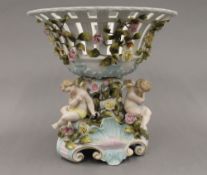 A 19th century Continental figural porcelain tazza. 30 cm high.