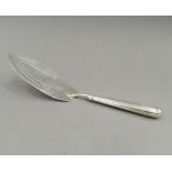 A George III silver fish slice. 28.5 cm long (4.