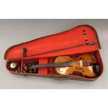 A 19th century violin with bow and case,