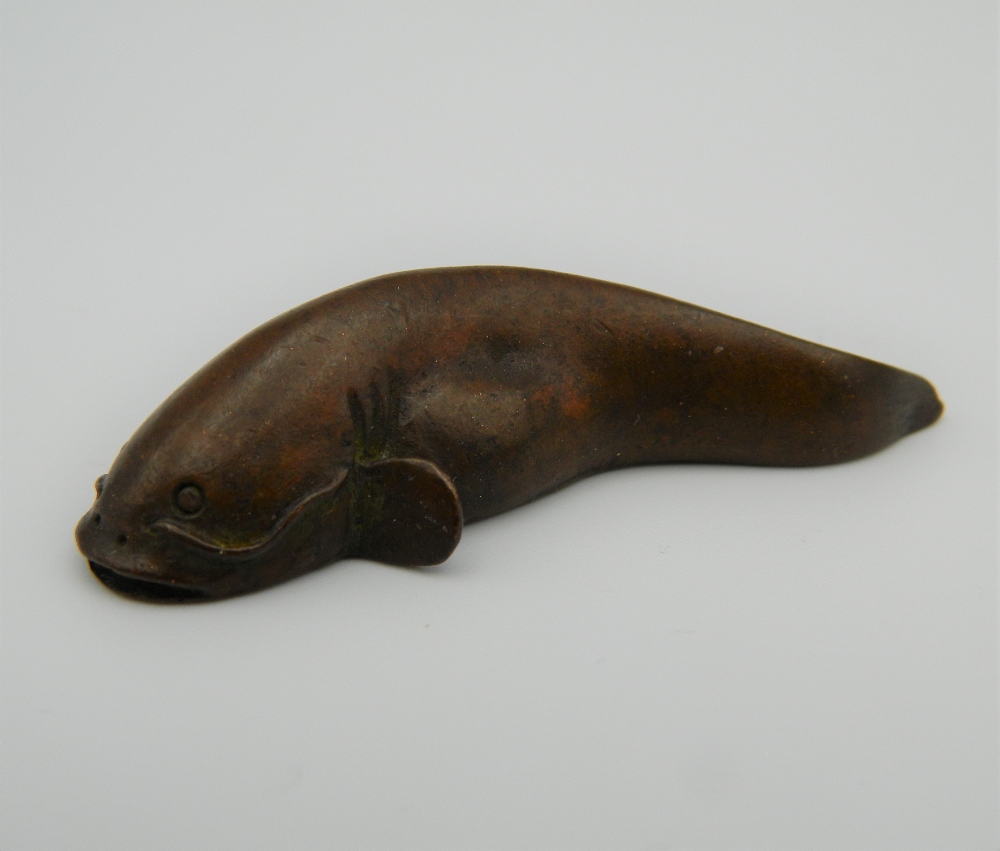 A small Japanese bronze model of a fish. 5.5 cm long.