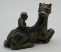 A Chinese bronze horse and monkey scroll weight. 5 cm high.