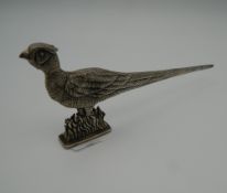 A sterling silver letter opener formed as a pheasant.