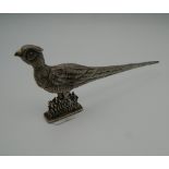 A sterling silver letter opener formed as a pheasant.