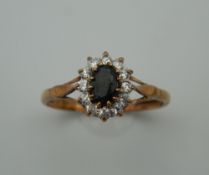 A 9 ct gold sapphire ring. Ring Size Q (1.