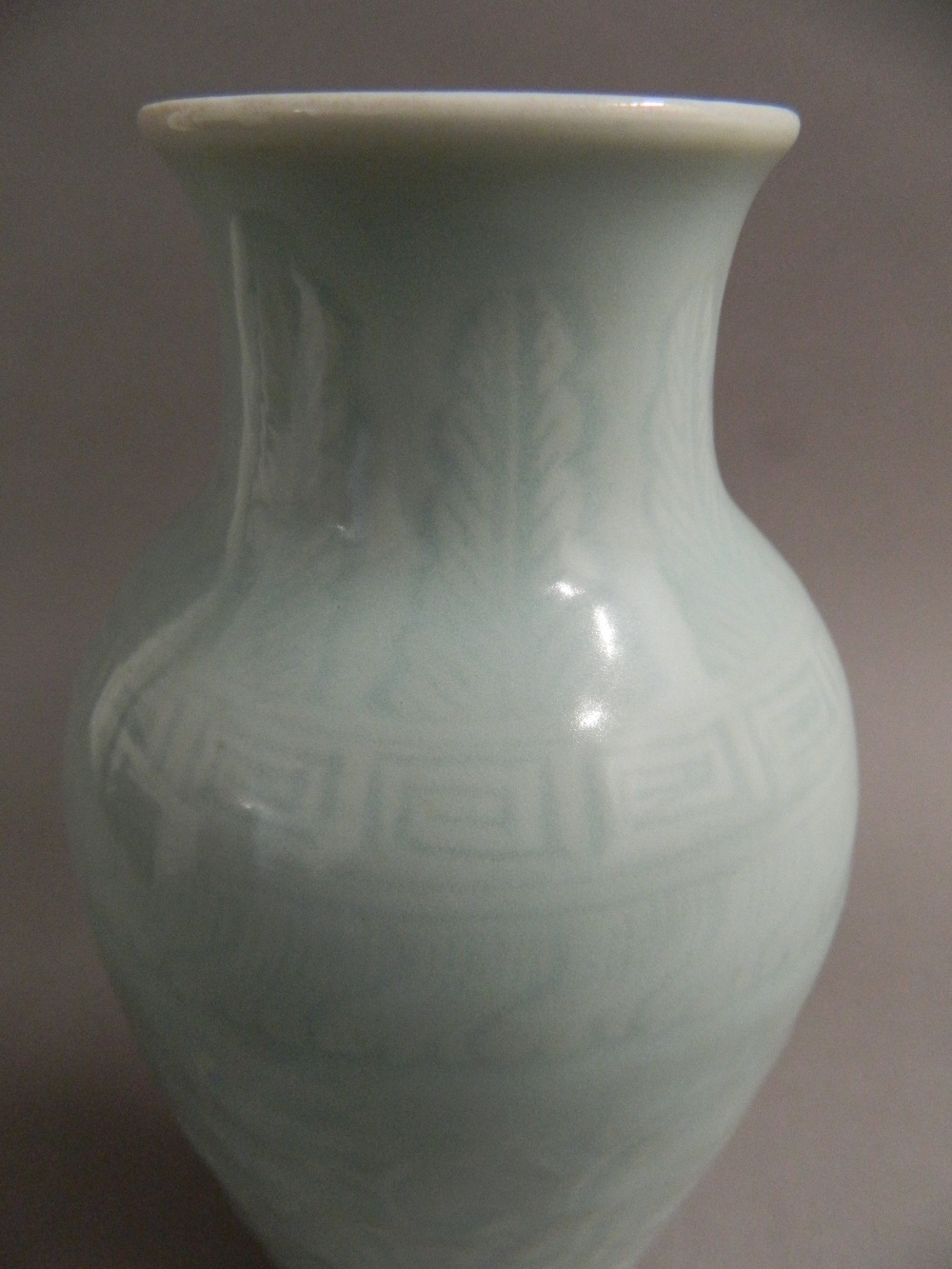 A Chinese porcelain vase Of slender baluster form, with all over celadon glaze, - Image 2 of 9