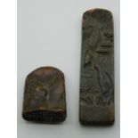 Two Chinese bronze seals decorated with mountainous landscapes. The largest 9 cm high.