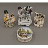 A Continental figure, pot lid and two Staffordshire figures. The former 18.5 cm high.
